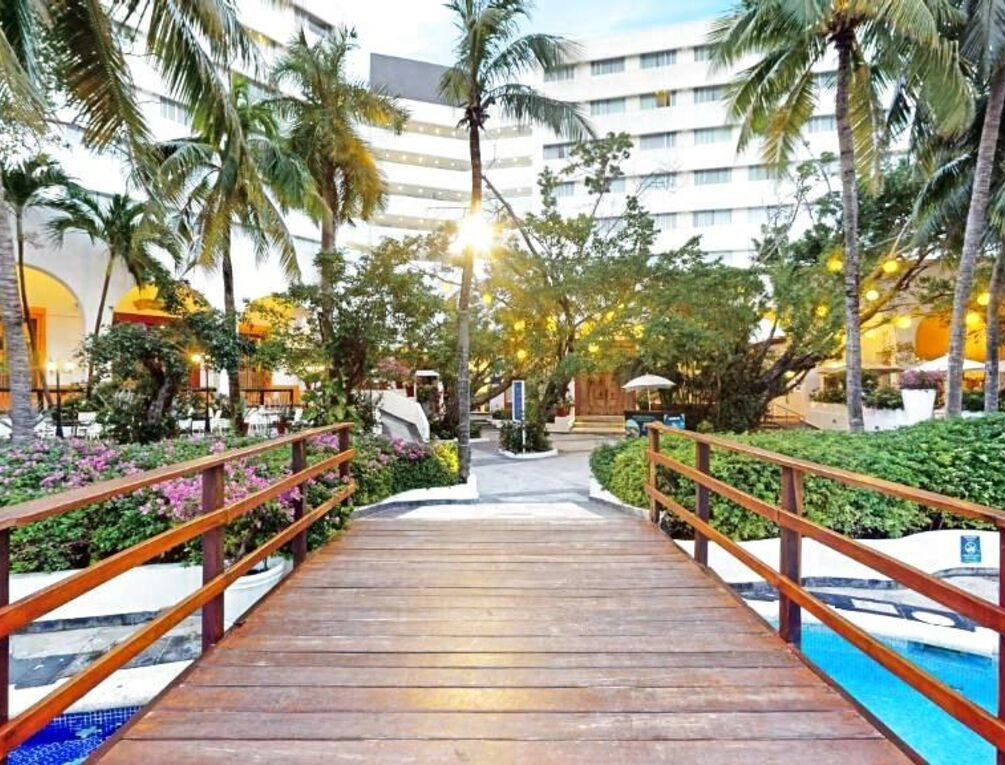 Habitaciones y áreas comunes de Gran Oasis Palm en Cancún