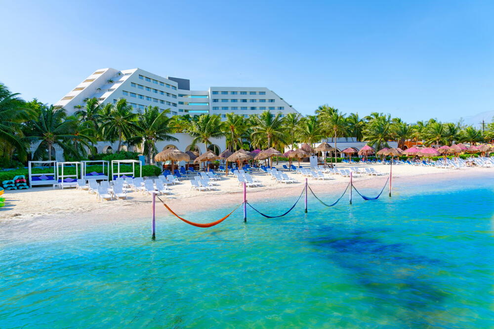 Gran Oasis Palm con áreas familiares y ambiente vacacional